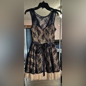 Elegant Lace Dress with Ribbon